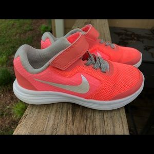 SOLD LIttle girls neon peach Nike’s